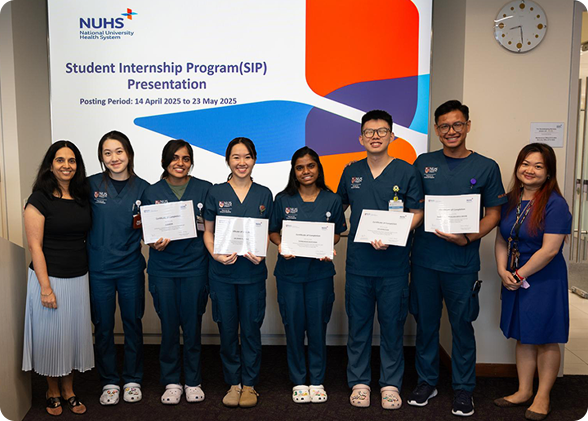 Haziq and classmates with Dr Arundhati