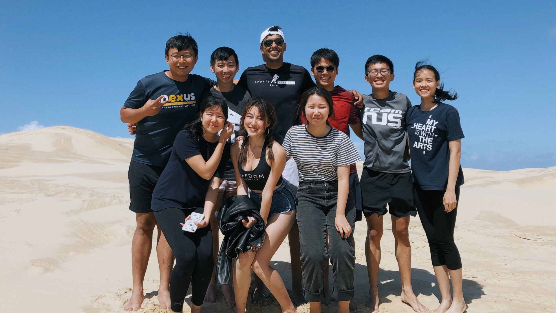 During her stint at the University of Sydney, Melanis (front row, second from left) participated in various activities such as sandboarding.