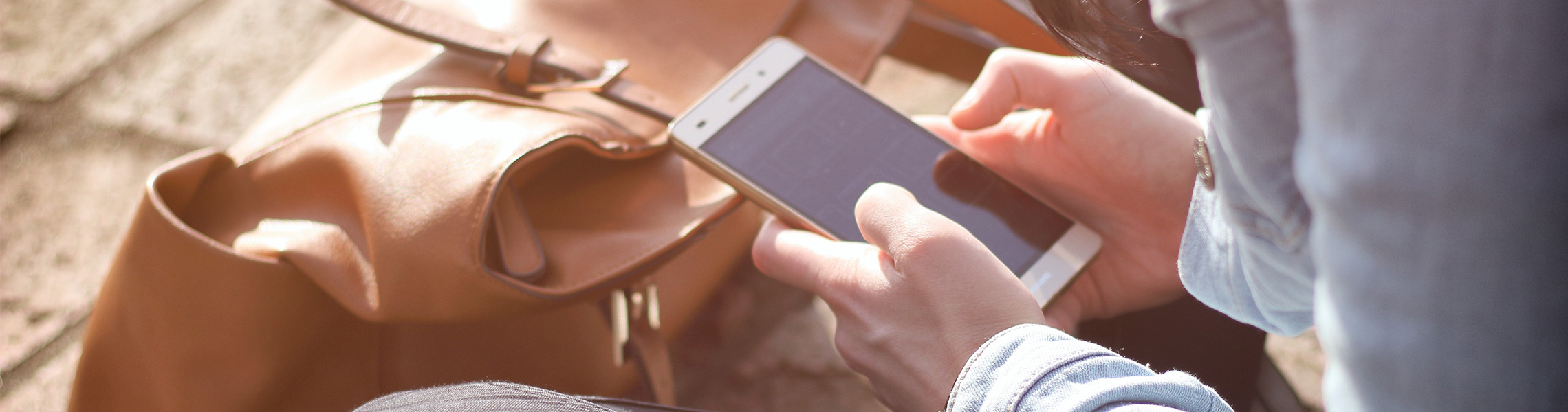 student using mobile phone